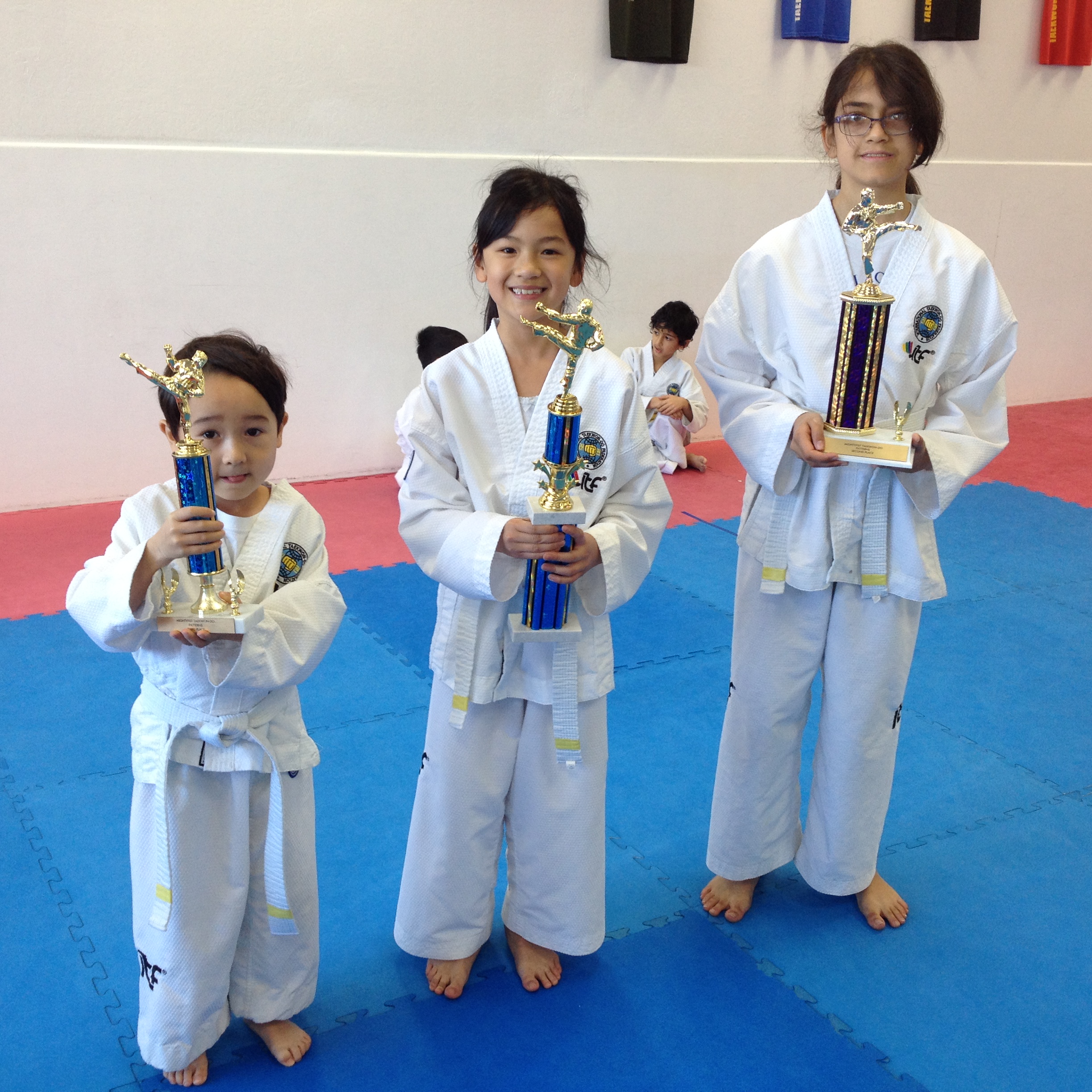 Mightyfist Taekwondo Kids with trophies